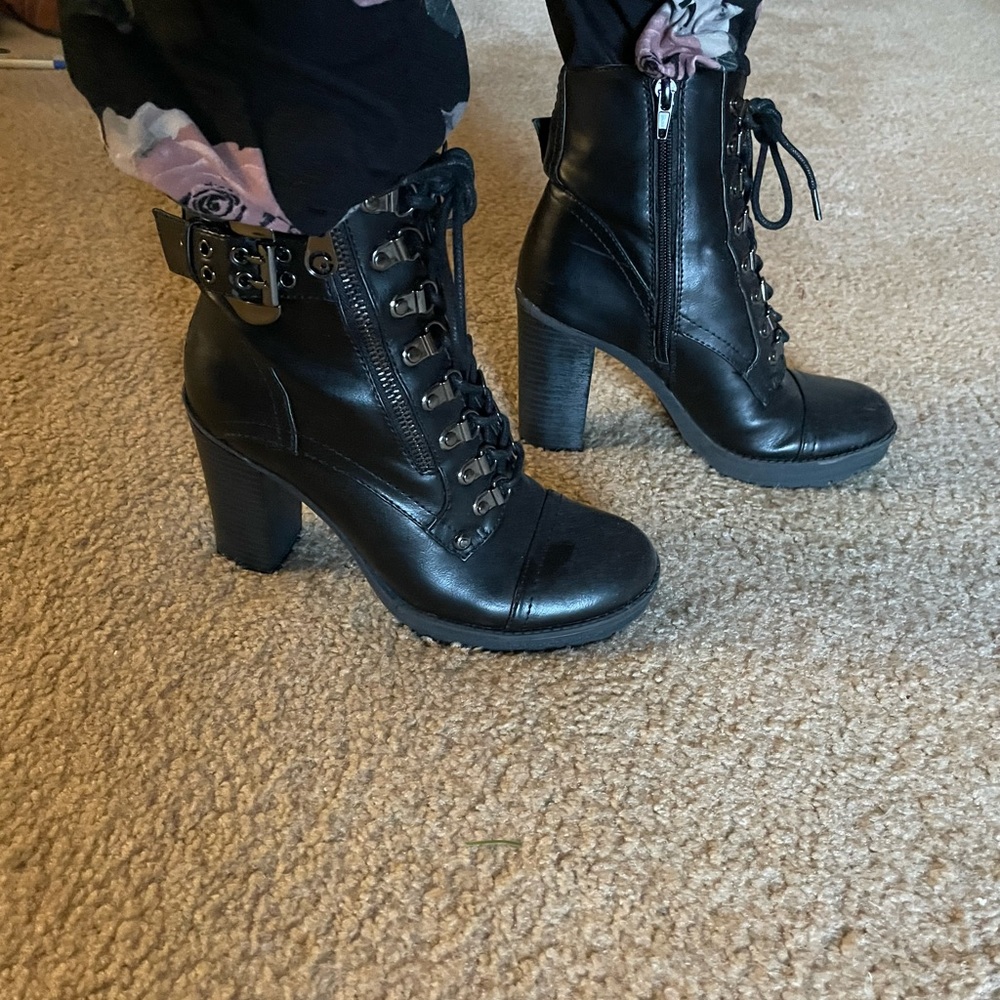 Black heeled lace up boots